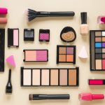 various-cosmetics-types-scattered-beige-table
