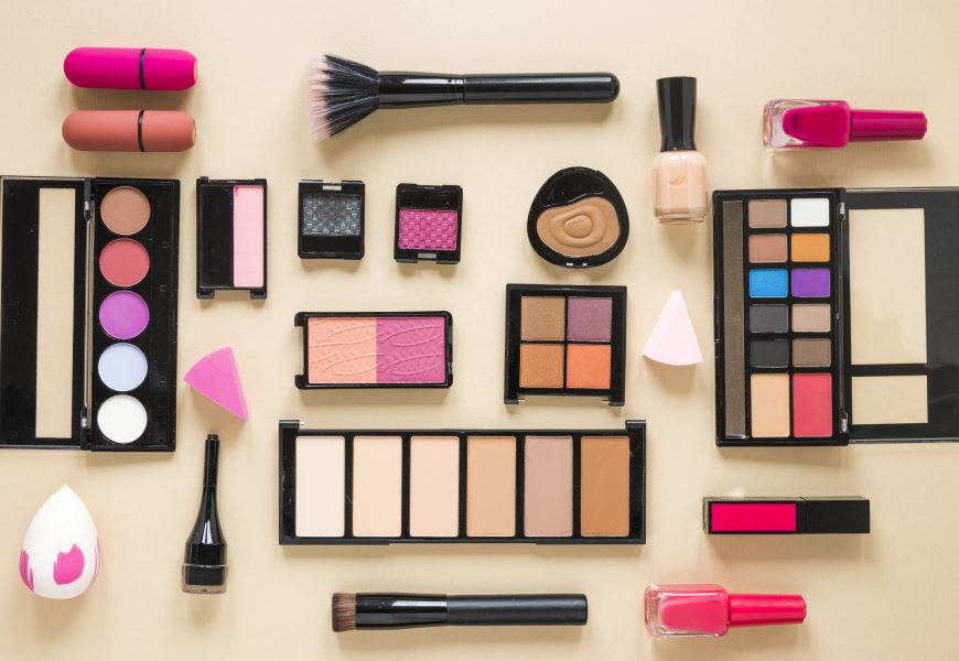 various-cosmetics-types-scattered-beige-table