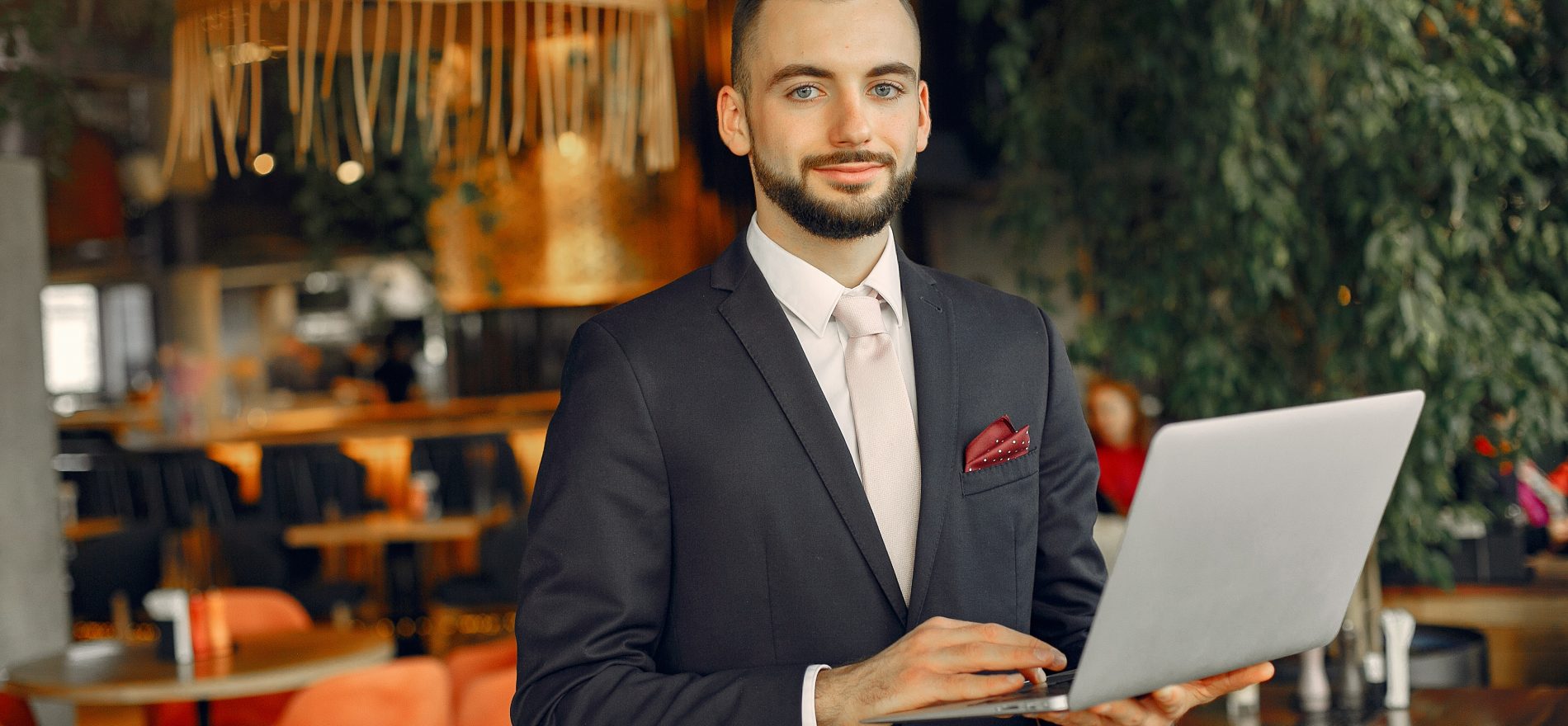 man working with laptop in a event