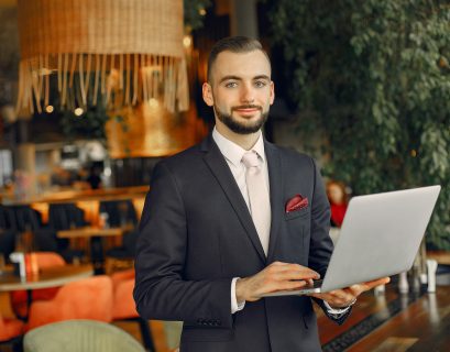 man working with laptop in a event