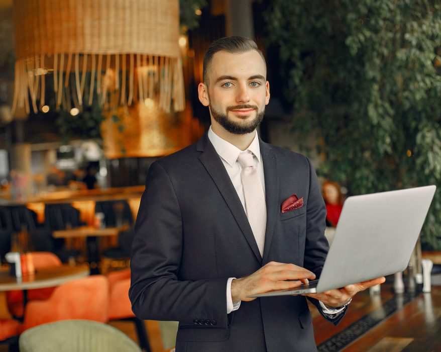 man working with laptop in a event