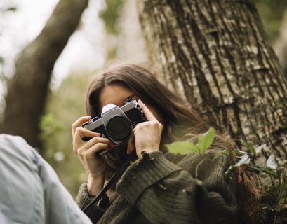 young women taking photo of nature