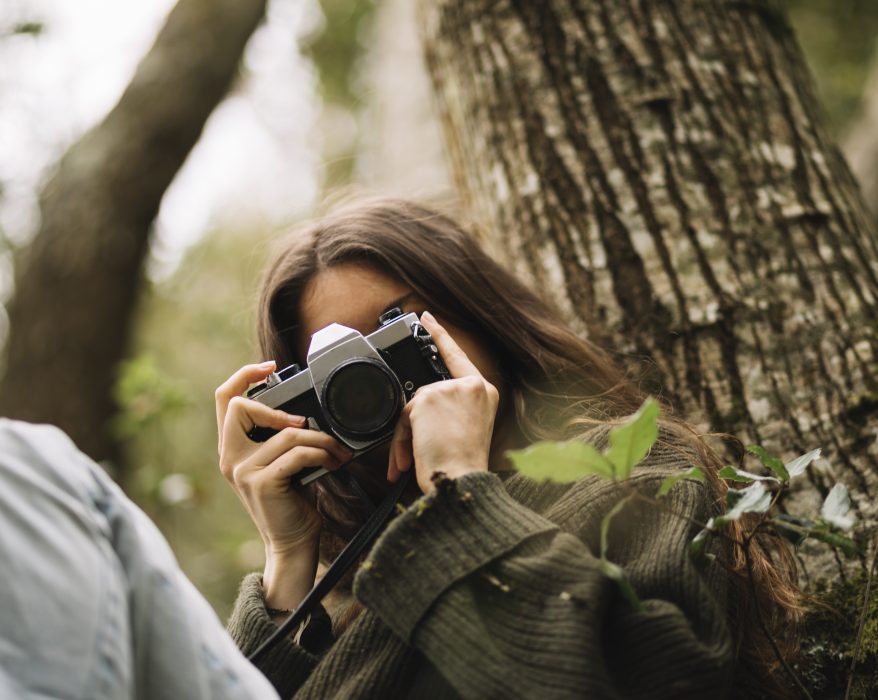 young women taking photo of nature